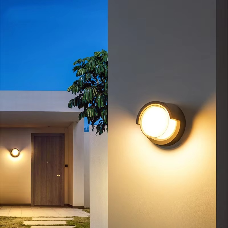 Outdoor Wall Sconce with Motion Sensor LED and Weather-Resistant Geometric Design - Image 6