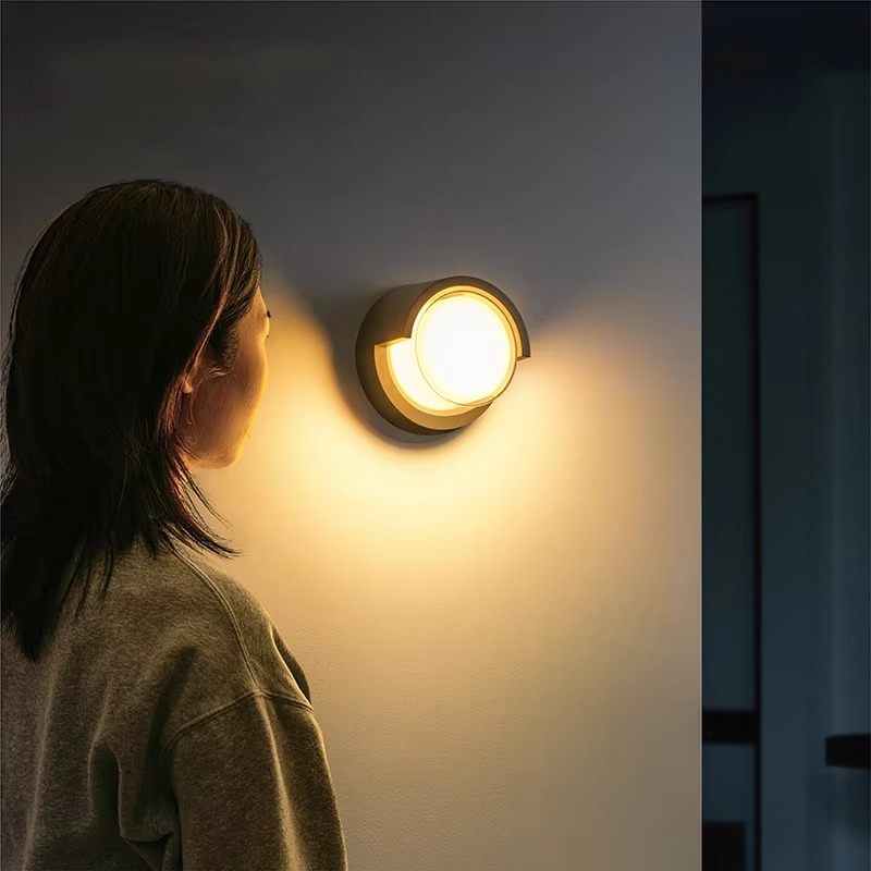 Outdoor Wall Sconce with Motion Sensor LED and Weather-Resistant Geometric Design - Image 7