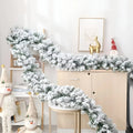 Snow Flocked Artificial Christmas Garland for Mantle and Stairs with Bendable Wire - Image 1