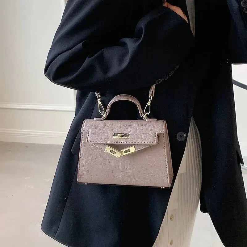 Women's Structured Top Handle Handbag with Gold Hardware and Turn Lock Closure - Image 2